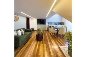 Living area - Arbórea Boutique | Duplex Suite + Designer Bathtub (Cuenca)