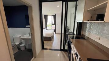 Comfort Condo, Pets not allowed, Garden View | Iron/ironing board, free WiFi