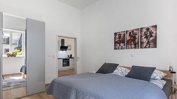 1 slaapkamer, een strijkplank/strijkijzer, wifi, beddengoed