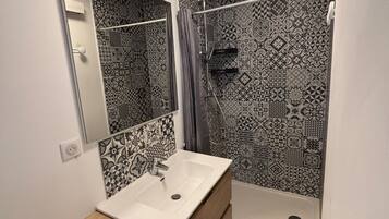 Shower, towels, toilet paper