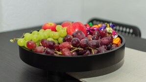A bowl of mixed fruits on a table with a remote control in the background. - Entire rental unit in Tyne and Wear, United Kingdom (Gateshead)