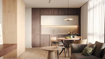 Quarto executivo, 1 quarto | Área de estar | Smart TV 55 polegadas com canais digitais