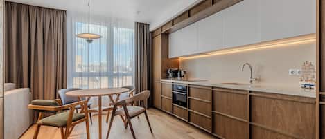 Executive Room, 1 Bedroom | Private kitchen | Coffee/tea maker, full-size fridge, oven, electric kettle
