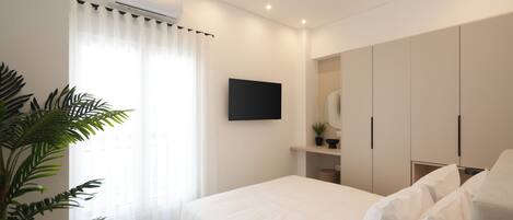 Appartement Confort | Coffres-forts dans les chambres, rideaux occultants