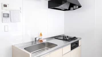 Fridge, microwave, cookware/dishes/utensils