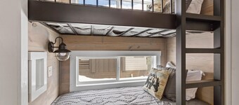 Ponderosa Cabin - Spacious floor plan with modern look, full kitchen, hallway bunk beds, separate bedroom, and upstairs loft
