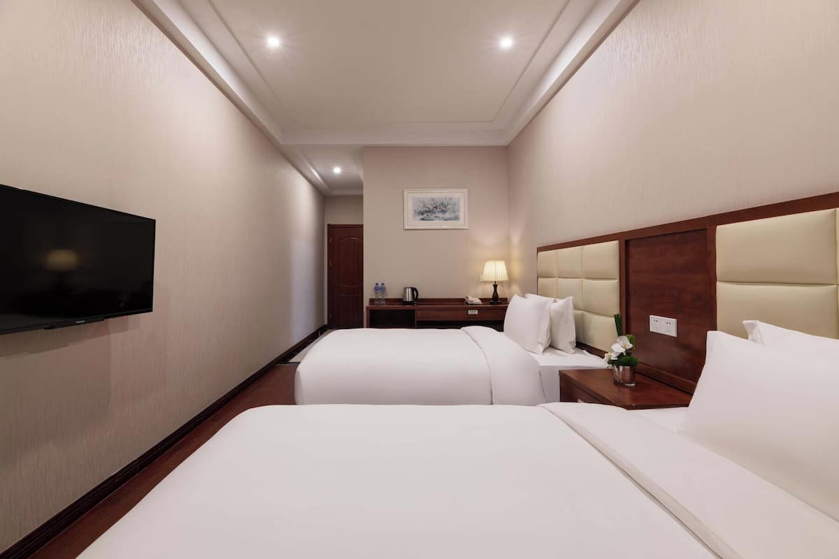 Phòng 2 giường đơn Tiêu chuẩn | Bộ đồ giường cao cấp, minibar, trang trí khác biệt
