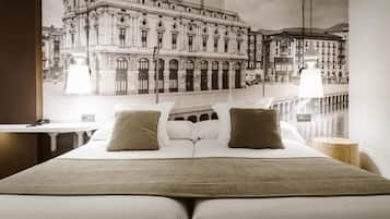 Desk, laptop workspace, bed sheets