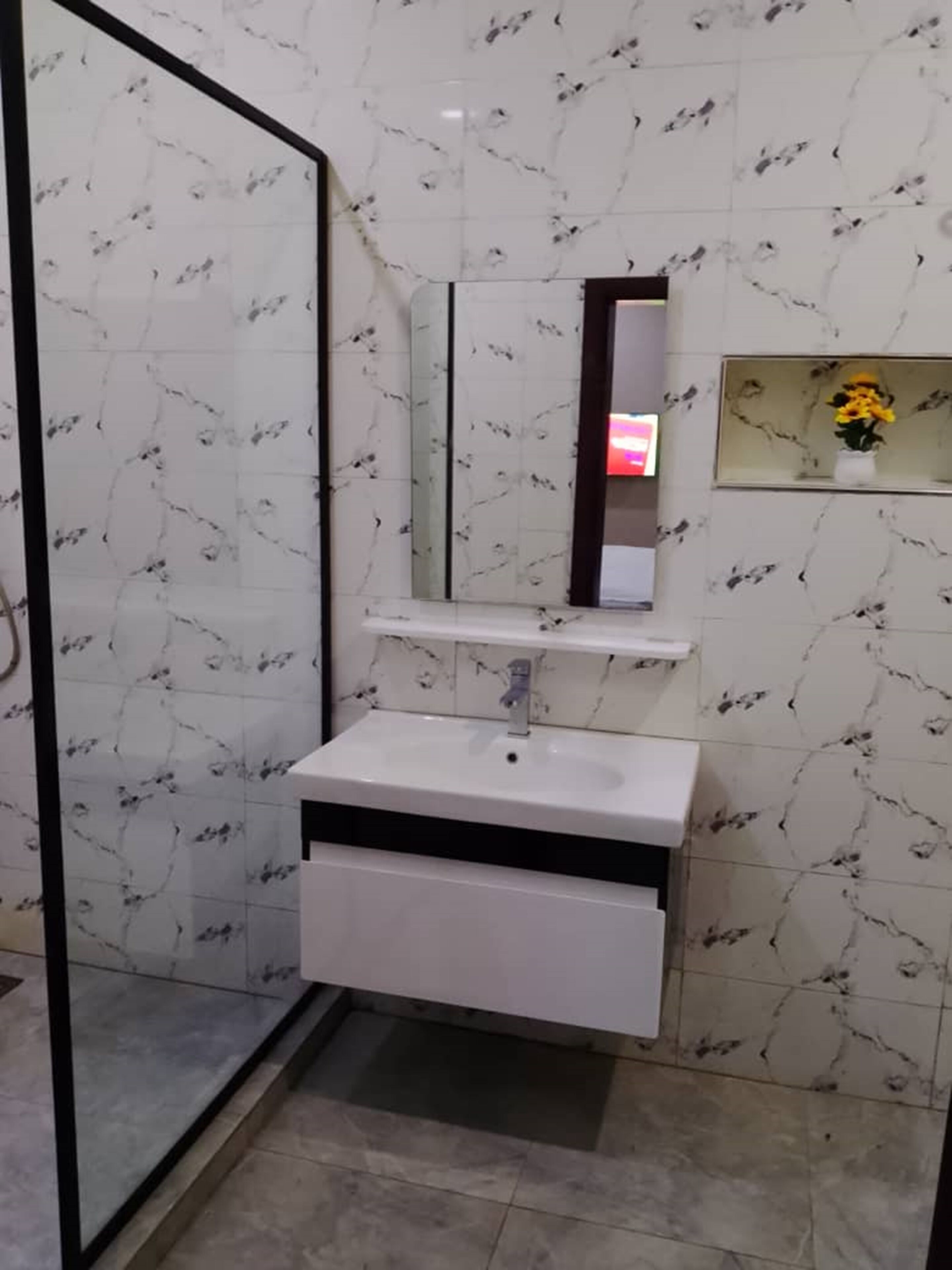 Shower, towels, soap, toilet paper