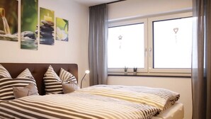 1 habitación, tabla de planchar con plancha, wifi y ropa de cama 