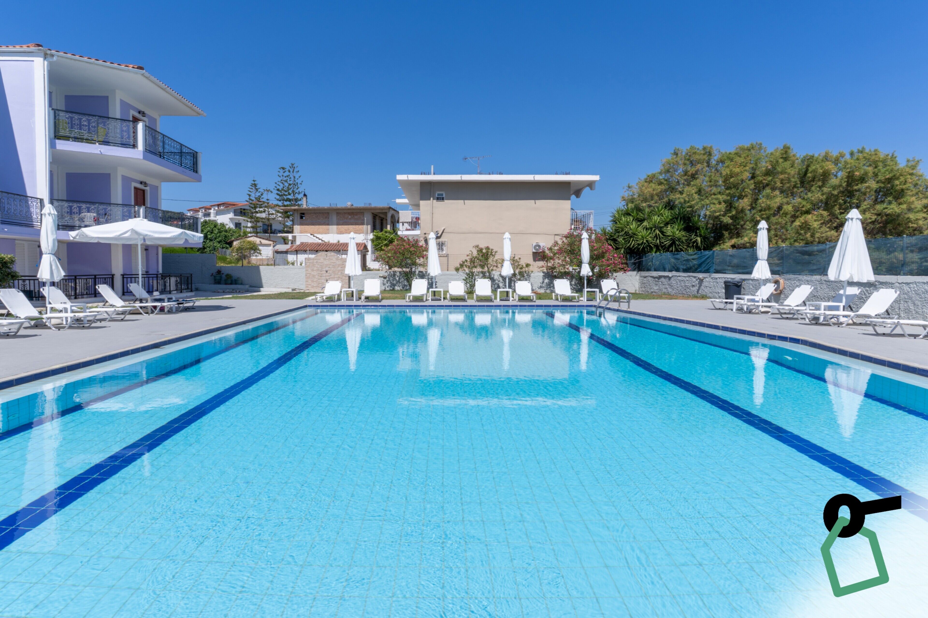Seasonal outdoor pool, open 10:00 AM to 6:00 PM, pool umbrellas