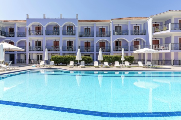Seasonal outdoor pool, open 10:00 AM to 6:00 PM, pool umbrellas
