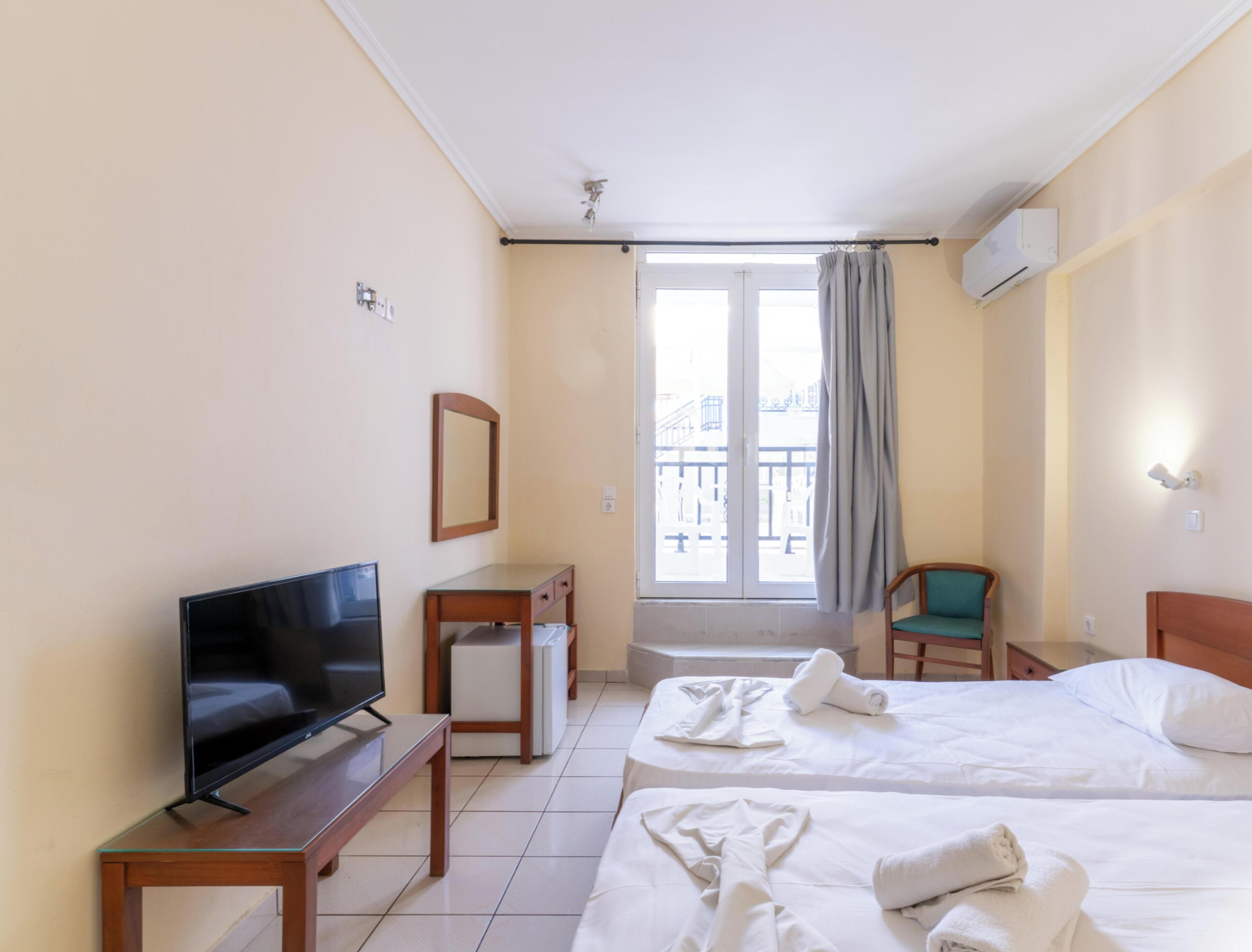Economy Room, Patio, Pool View | WiFi (free), bed sheets