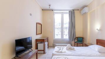 Economy Room, Patio, Pool View | WiFi (free), bed sheets