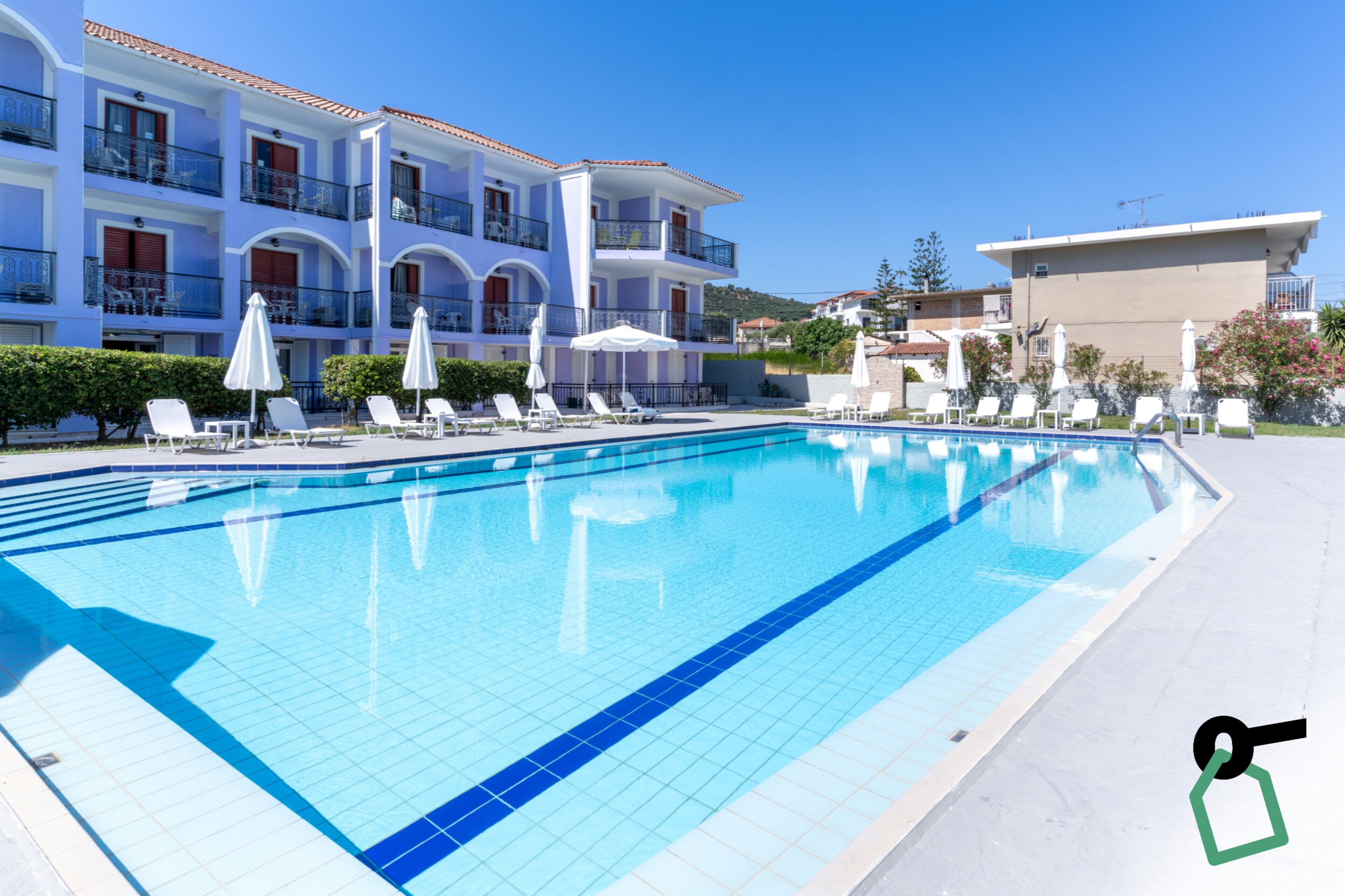 Seasonal outdoor pool, open 10:00 AM to 6:00 PM, pool umbrellas