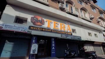 A building with a restaurant named 'Tera' on the ground floor.