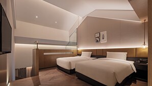 A modern hotel room with two beds, a desk, and a large window. - Sail Hotel (Chongqing)