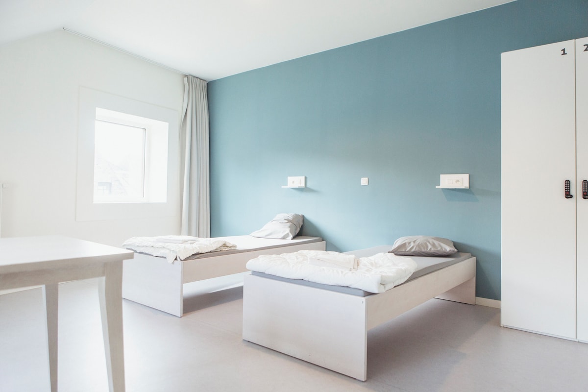 Quarto duplo conforto, banheiro privativo | Edredons de pluma, cofres nos quartos, cortinas blackout