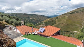 Seasonal outdoor pool, pool umbrellas, pool loungers