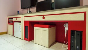 A room with a kitchenette, a TV, and a hairdryer. - Yeongdeungpo Hotel Jago (Seoul)