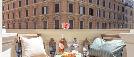 Deluxe Triple Room, Multiple Beds | Outdoor dining