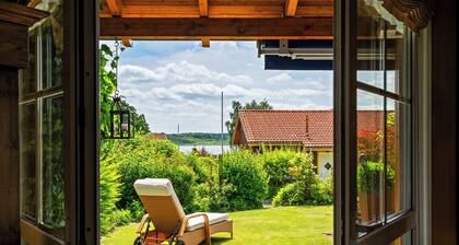 Kathi Vacation Home on Lake Jabelschen with a Garden, Terrace, and Fireplace