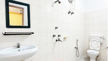 Shower, rainfall showerhead, slippers, towels