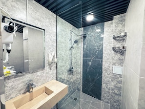 Deluxe Triple Room, Balcony, City View | Bathroom | Free toiletries, hair dryer, slippers, towels