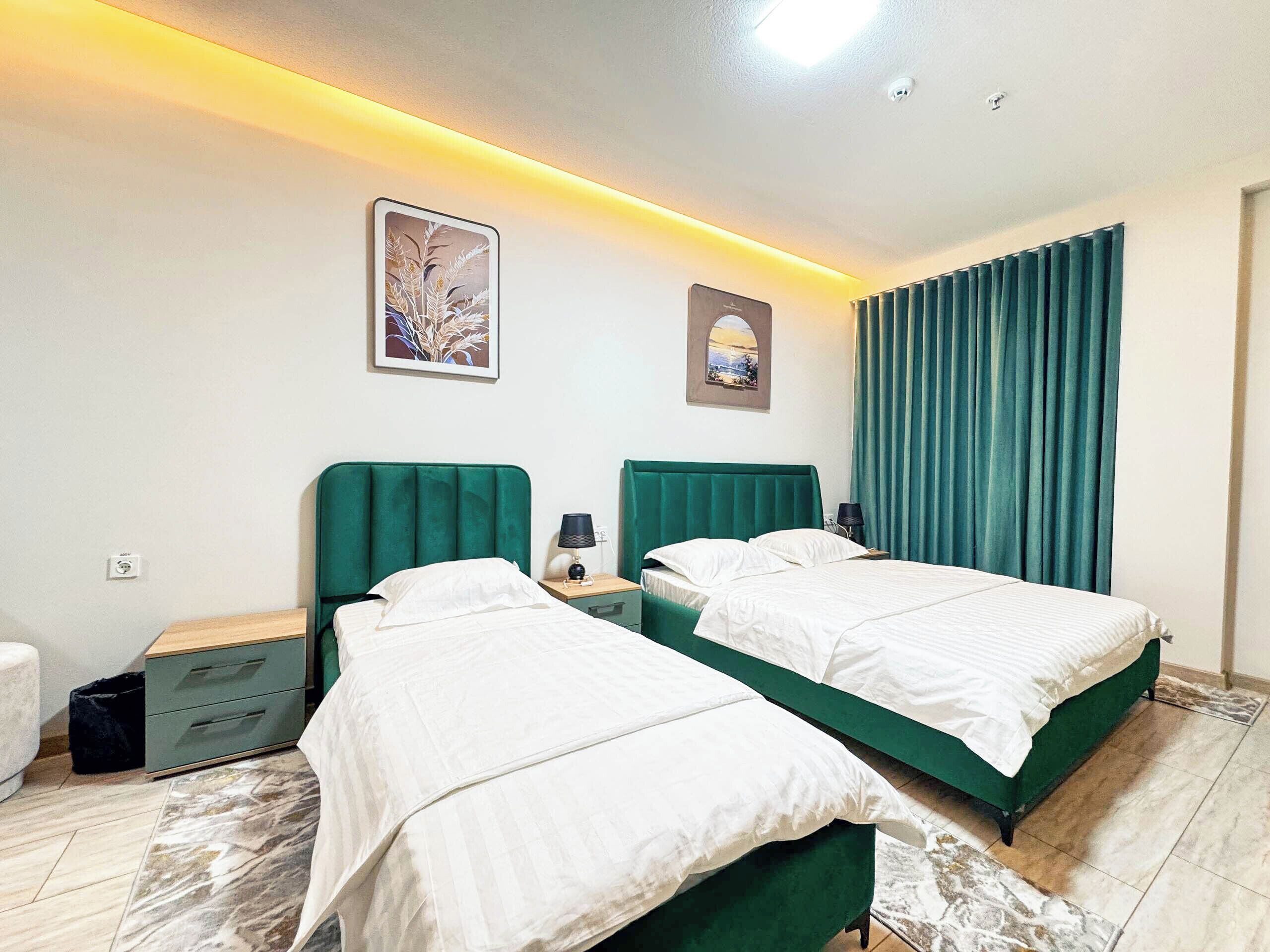 Deluxe Room, Balcony, City View | In-room safe, blackout drapes, iron/ironing board, free WiFi