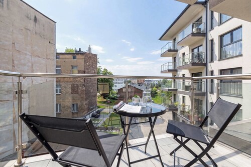 Beige and Pink Apartment | Balcony | Desk