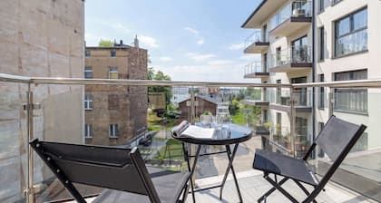 Beige and Pink Apartment | Balcony | Desk