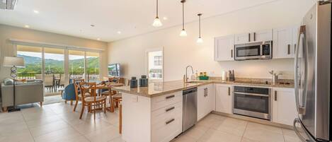 Coffee/tea maker, fridge, microwave, oven