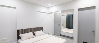 X90 Studio Apartments