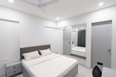 X90 Studio Apartments