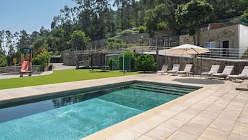 Seasonal outdoor pool, pool umbrellas, sun loungers