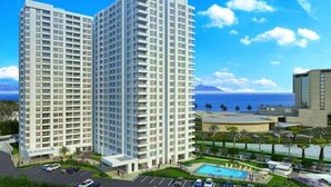 A high-rise hotel with multiple floors, a swimming pool, and a view of the ocean. - Dept. 14th Floor, Marina Costa (Coquimbo)