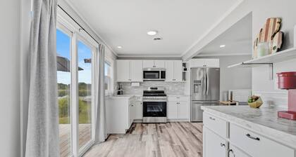 Peaceful 2-bedroom cottage on beautiful First Lake in Six Lakes, Michigan.