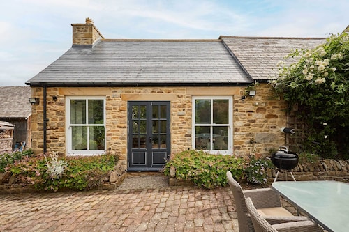 Host & Stay | The Coach House