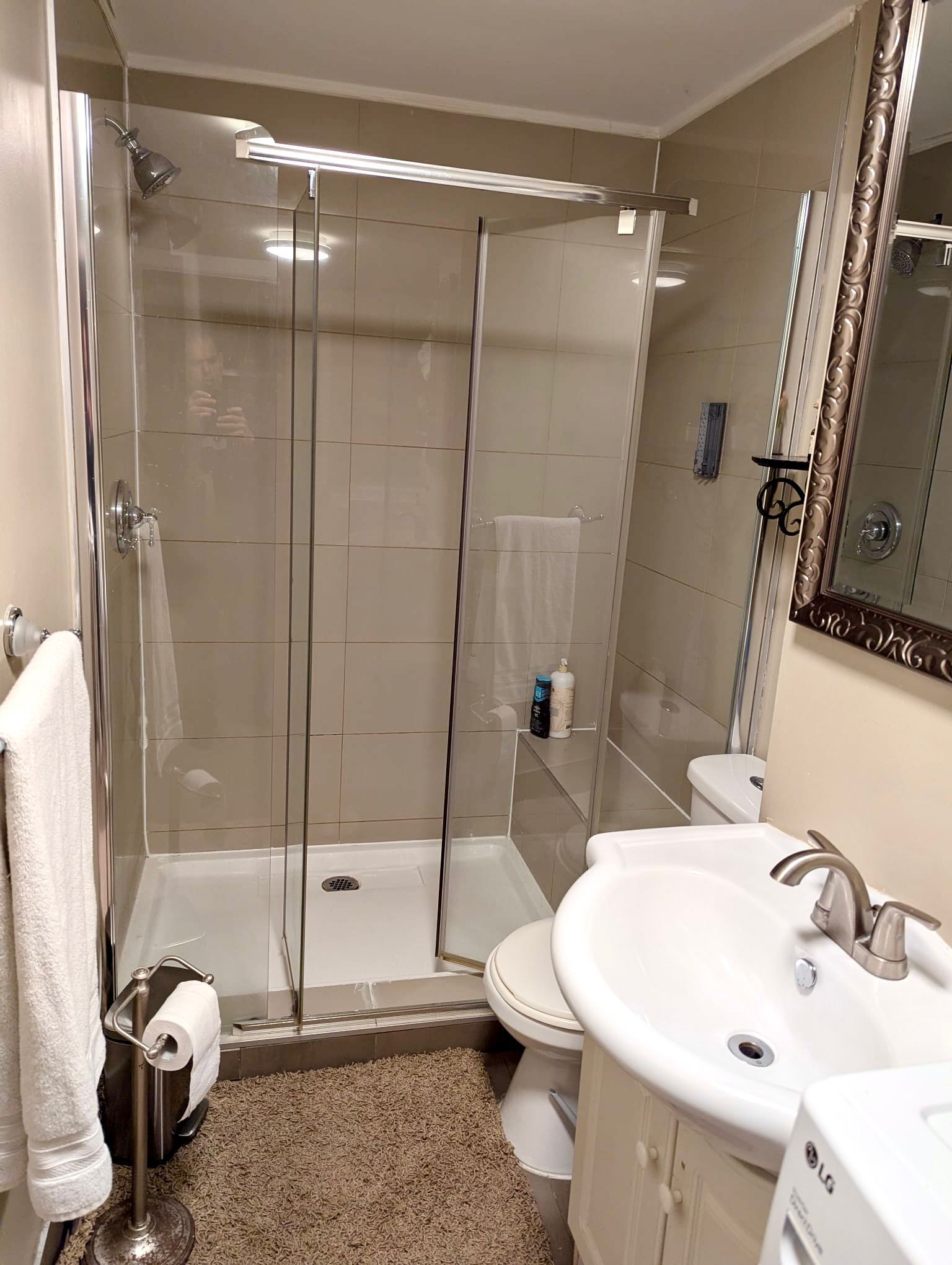 Shower, towels, soap, toilet paper