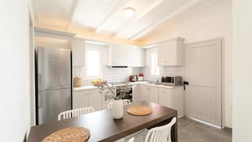 Honeymoon Suite with Panoramic Sea View | Private kitchen | Fridge, oven, stovetop, highchair