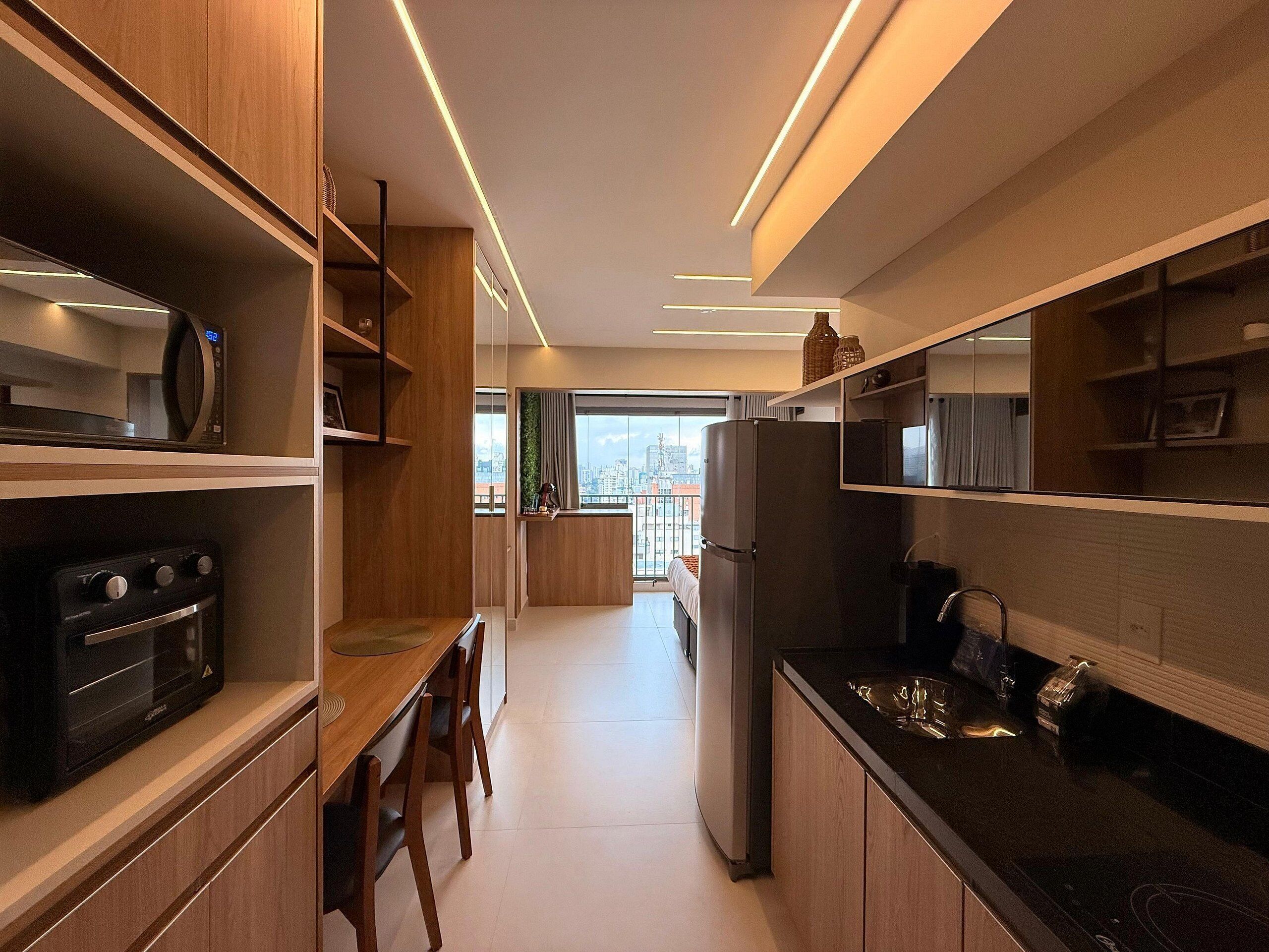 Apartamento | Cozinha privada | Geladeira, micro-ondas, fogão, cooktop
