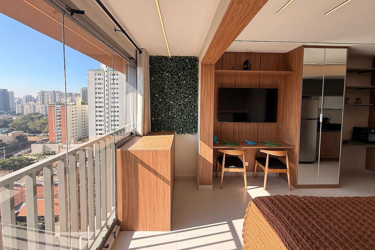Basic Apartment | Desk, laptop workspace, blackout drapes, iron/ironing board