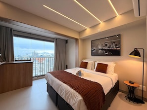 Apartment | Desk, laptop workspace, blackout drapes, iron/ironing board