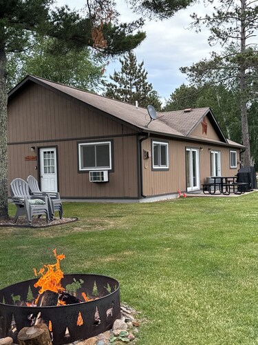 Cozy 2-bedroom cabin in tranquil Side Lake. On the water, dock space available.