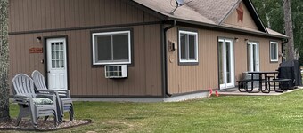 Cozy 2-bedroom cabin in tranquil Side Lake. On the water, dock space available.