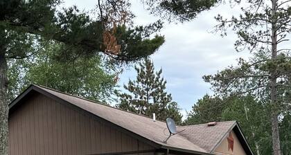 Cozy 2-bedroom cabin in tranquil Side Lake. On the water, dock space available.