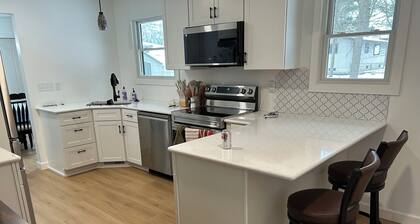 Cozy, newly renovated home with a gorgeous fireplace and office space.