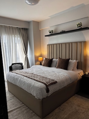 Apartamento empresarial, vista para a cidade | Wi-Fi de cortesia, roupa de cama