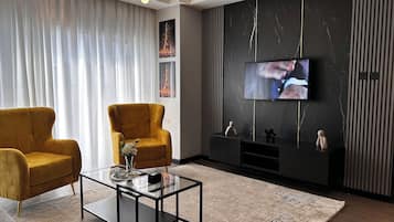 Leilighet – business, byutsikt | Oppholdsområde