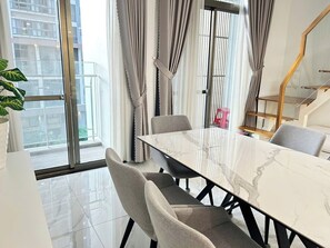 Superior Studio Suite, Balcony, Garden View | Dining - Lumiere Home by Henry Nguyen  (Ho Chi Minh City)